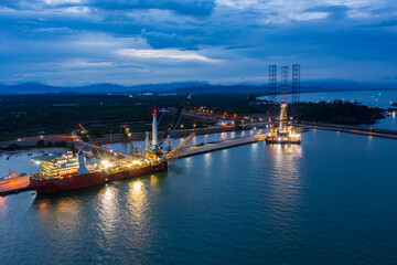 Obraz premium Aerial view of offshore jack up rig in a shipyard for oil and gas exploration and production 
