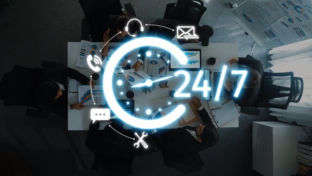 A modern office scene highlights a dynamic team working together on strategic plans. Emphasizing 24-hour availability, digital connection symbols overlay the image. Raster