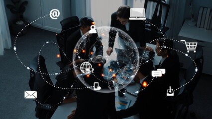 A dynamic business meeting scene showing diverse professionals engaged in strategic collaboration, surrounded by technology icons symbolizing global connectivity. Raster