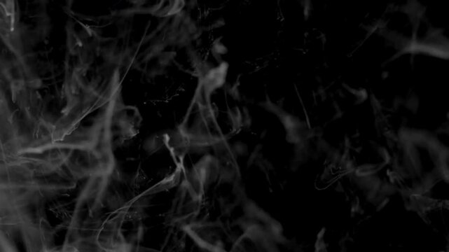 smoke and fog abstract background Loopable abstract swirling smoke and a soft, radiant light rising from below against a black background  useful as an overlay layer, dynamic and ethereal fog effect