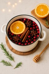 Christmas Mulled Wine Preparation with Oranges, Star Anise, and Cranberries 