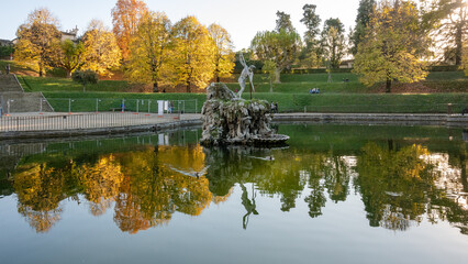 The Fountain of Neptune in the Boboli Gardens, Florence, Italy. A masterpiece of Renaissance art surrounded by greenery and history in one of the most iconic Italian gardens.