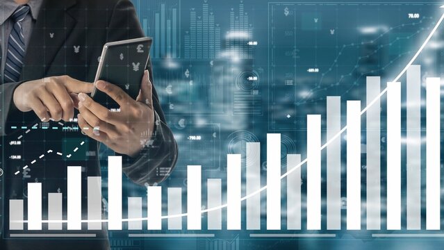 A businessman interacts with a smartphone to explore financial data and statistics, featuring digital graphs and charts that highlight trends and growth. Copula