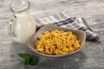 Corn flakes with milk for breakfast