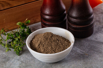 Ground dry black pepper powder