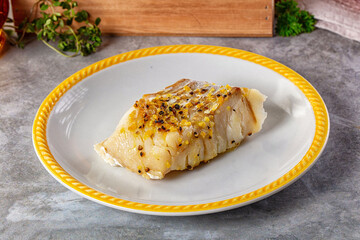 Steamed cod fish fillet with spices