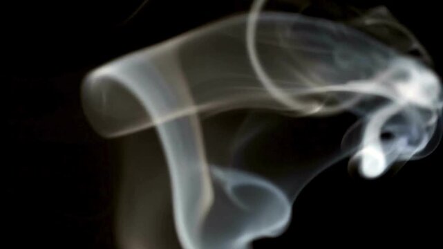 smoke and fog abstract background Loopable abstract swirling smoke and a soft, radiant light rising from below against a black background  useful as an overlay layer, dynamic and ethereal fog effect