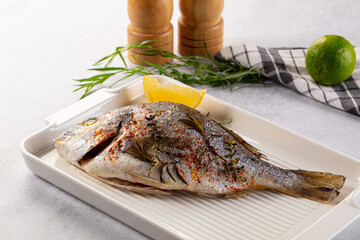 Baked dorada fish with spices