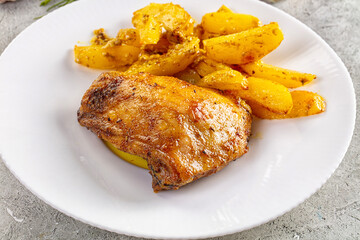 Baked chicken thighs with potatoes