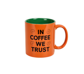 Orange coffee mug with green interior saying in coffee we trust
