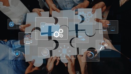 A diverse group of professionals collaboratively solving a puzzle while surrounded by digital graphics representing data, technology, and strategic innovation for business growth. Raster