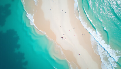 Aerial view of tropical sandy beach with turquoise ocean waves and people walking
