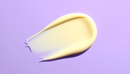 Creamy cosmetic smear with iridescent sheen on pastel purple background for editorial beauty photography skincare decor and poetic allure-themed visuals