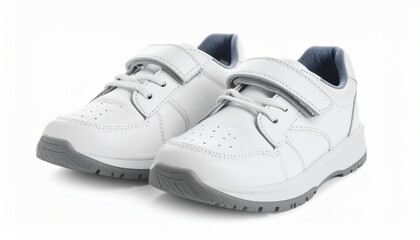 White children’s athletic shoes with Velcro straps and gray soles on white background for editorial footwear photography kidswear decor and poetic utility-themed visuals