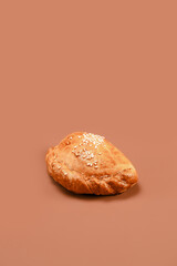 Stuffed Pastry Close-Up on Solid Background
