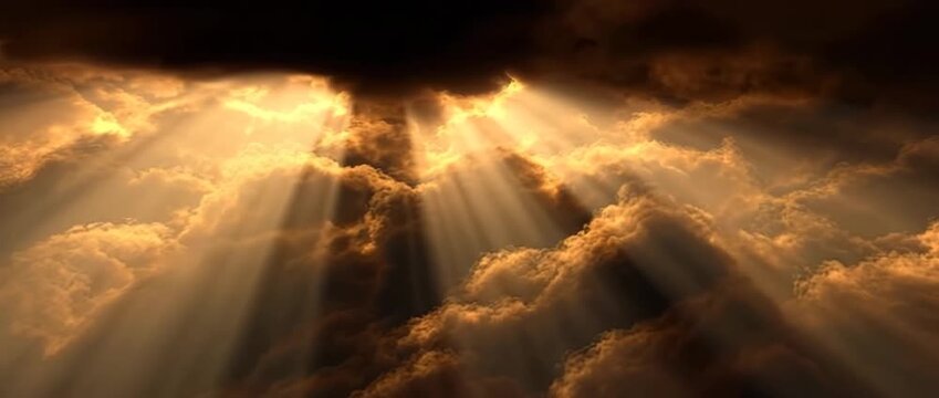 Golden sunlight shining through dramatic storm clouds