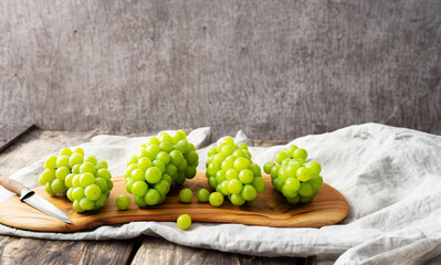 Shine Muscat, Green grapes on a cutting board