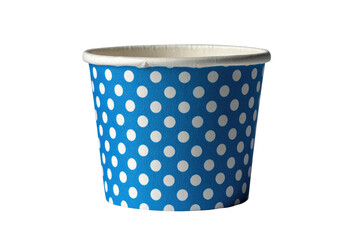 Polka-dotted paper cup, blue with white dots, against a black background