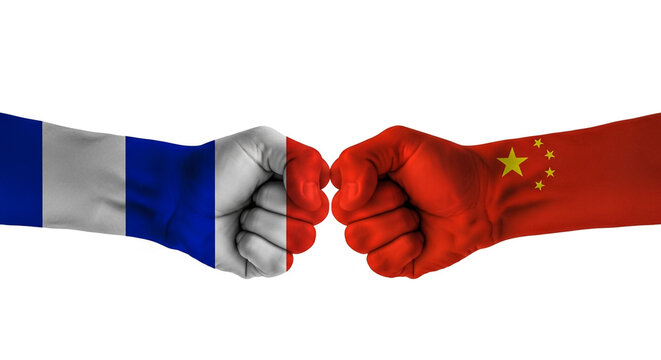 France versus china trade war concept with flag fist conflict and competition - Powered by Adobe