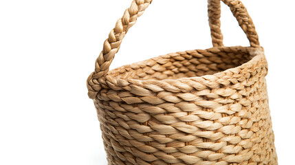 Obraz premium A woven basket with a handle crafted from natural fibers, offering a rustic and eco-friendly storage solution or decorative accent. Ideal for home organization.