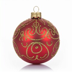 Festive red Christmas ball decoration with an elegant sparkling golden filigree design, isolated on a white background with reflection
