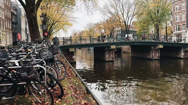 Explore the beauty of Amsterdam in autumn with colorful leaves, bicycles, and tranquil canals