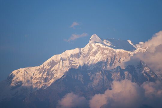 Landscape of Annapurna mountain range on cloudy sky before sunset in Pokhara , Nepal