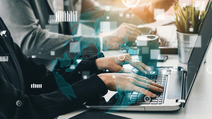 Two business professionals collaborate in a modern office setting, utilizing laptops while a digital interface overlays data and global connectivity visuals, symbolizing innovation. Xenic