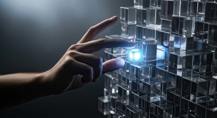 A hand interacts with a glowing blue cube within a structure of transparent cubes, symbolizing innovation, technology, and the power of individual elements