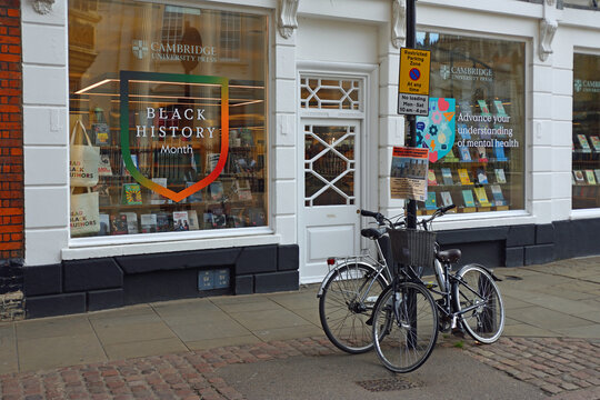 Cambridge Book Shop with bicycles outside locked to lampost.