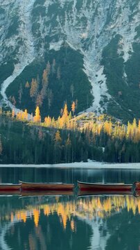 Discovering the Beauty of Lago di Bries in Italy with Calm Waters and Autumn Colors