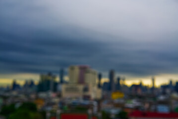 Fototapeta premium BLUE BUIDING AND SKY of clouds over the city at night IN BANGKOK THAILAND, PICTURE FOR MOTION BLUE CITYSCAPES 