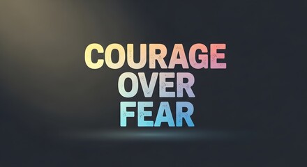 Inspirational quote displaying the message 'Courage Over Fear' in colorful, bold letters on a dark background to motivate and empower viewers