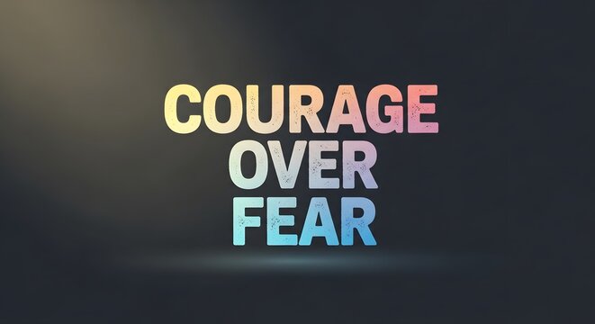 Inspirational quote displaying the message 'Courage Over Fear' in colorful, bold letters on a dark background to motivate and empower viewers