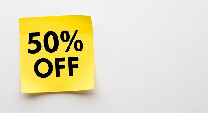 Grab amazing deals now with a bold 50% off announcement on a vibrant yellow sticky note