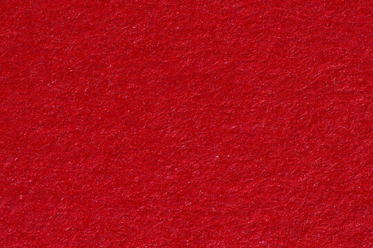 Red contrast paper background. Christmas content.