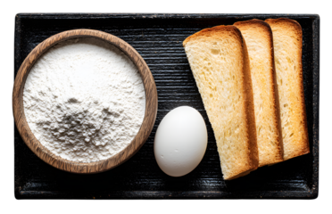 Overhead view of toast, egg, and flour on a dark tray isolated on transparent background baking ingredient top view isolated on transparent