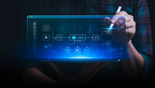 Artificial intelligence automation and AI agent workflow concept with person using digital tablet to design process diagram, symbolizing machine learning, innovation, and smart technology
