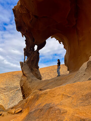 Young Woman Exploring the Arches of Las Peñitas, Fuerteventura