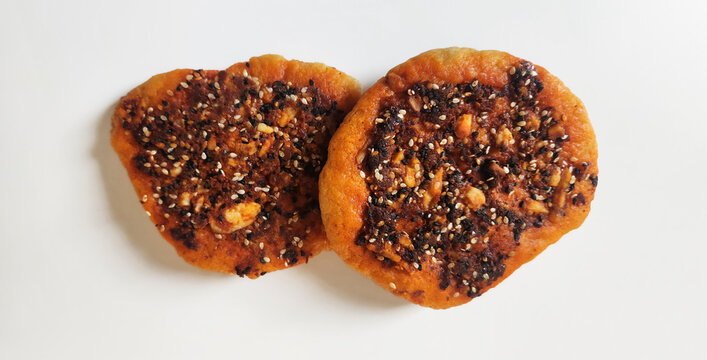 A traditional Turkish bread topped with red peppers and spices (biberli ekmek), crispy on the outside and flavorful on the inside