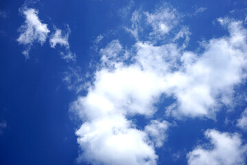 white clouds in the blue sky