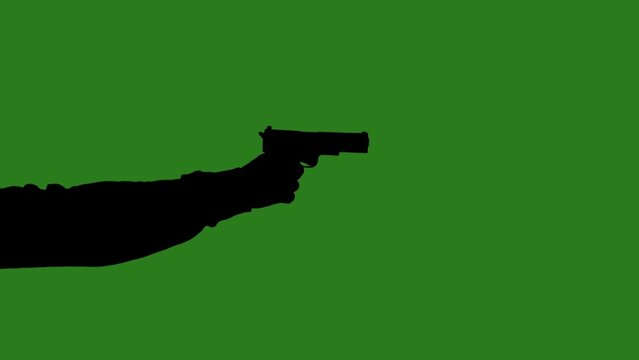 Black isolated silhouette of a hand with a gun on a green chromakey background. Minimalist contrast and modern visual composition, mockup.