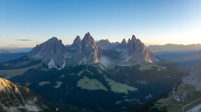Alpine Majesty: Rugged Dolomiti Peaks Rising Above Green Valleys