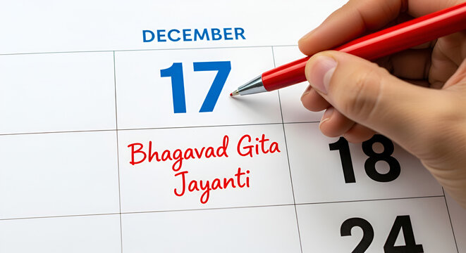 December 17. Hand writing text Bhagavad Gita Jayanti on calendar date. Save the date