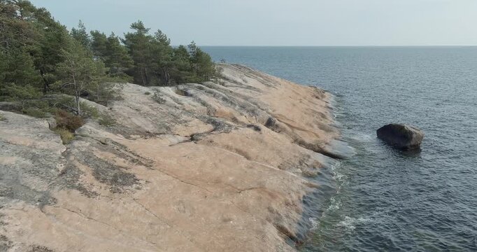 Aerial view of rocky seashore at Lerviksudden recreation area in sunny summer weather, Pirttisaari, Porvoo, Finland