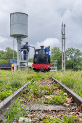 Steam locomotive refueling at Bligny sur Ouche station