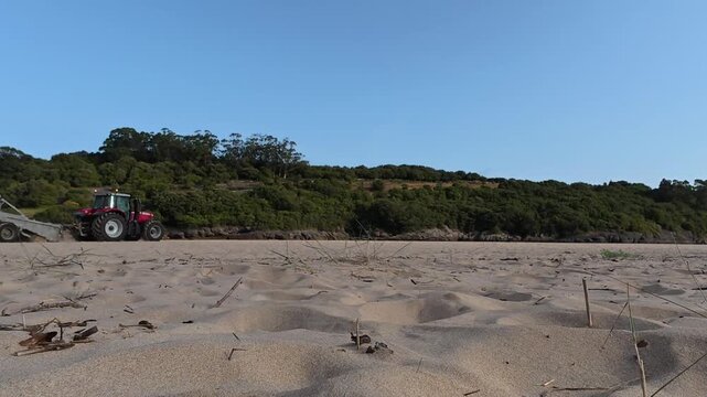 Passage de Dameuse sur plage de sable