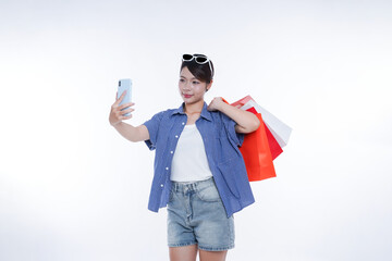 young asian girl with shopping bags