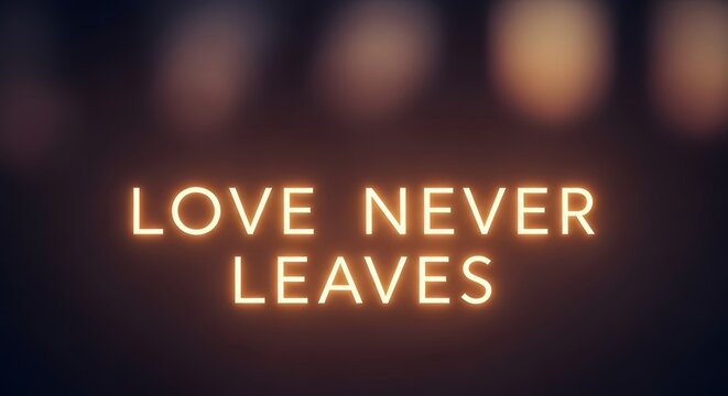 A neon sign displaying the message 'Love Never Leaves' against a dark background, creating a warm and inspiring visual effect