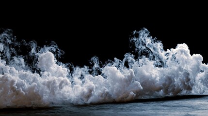 Dramatic wisps of white smoke elegantly swirl and dissipate low across a stark black background, creating a powerful, atmospheric visual perfect for abstract design or dramatic effect.